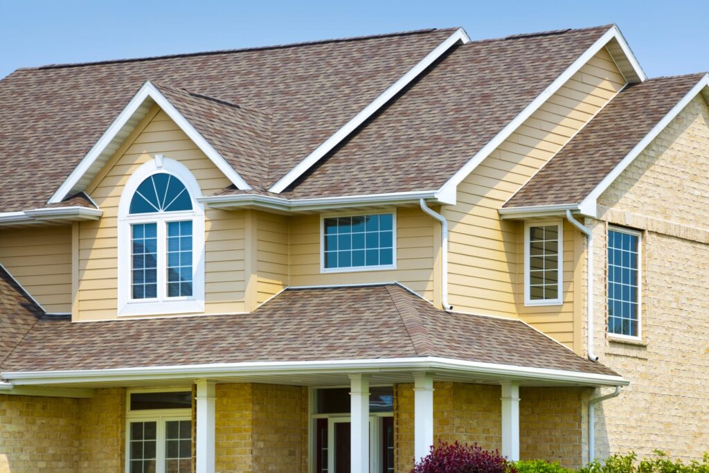 House with Brick, Architectural Vinyl Siding, Asphalt Shingle Roof Home