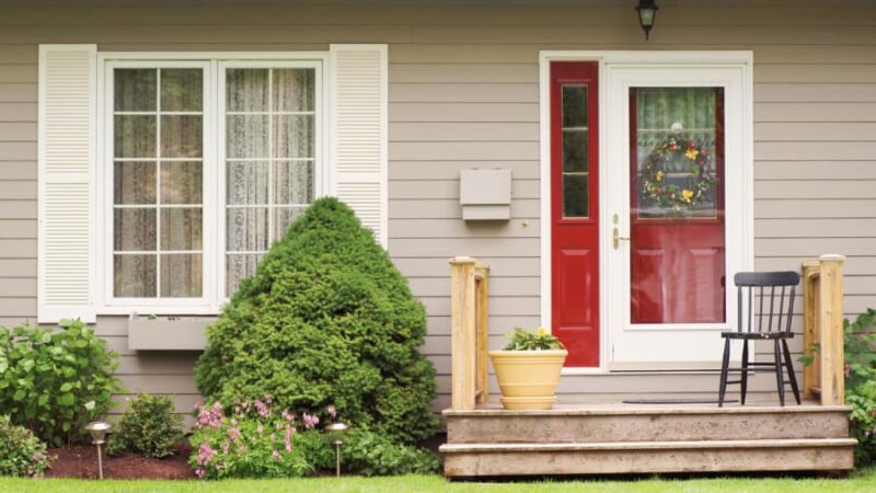 Front door and porch with spring decorations