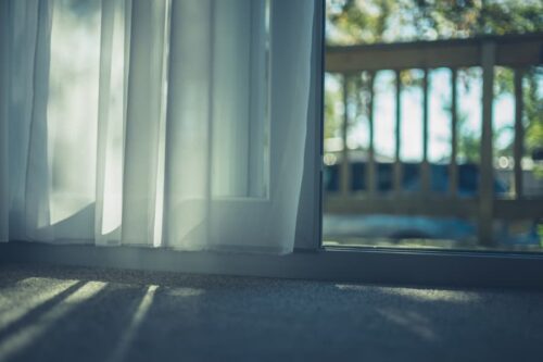 Blinds vs. Curtains: Best Privacy and Security Options for Patio Doors