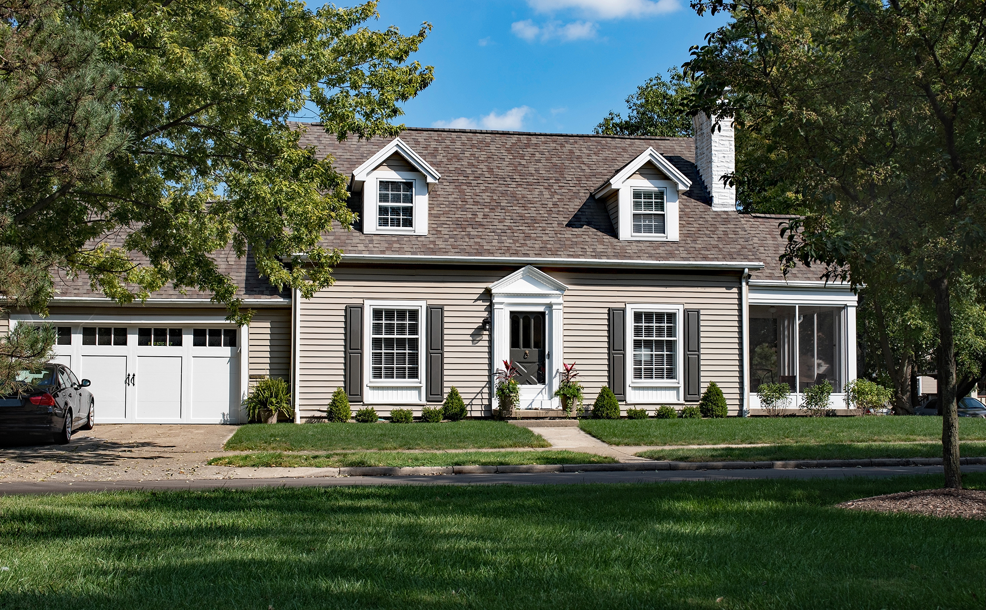 488624614-huge1 House and front lawn.
