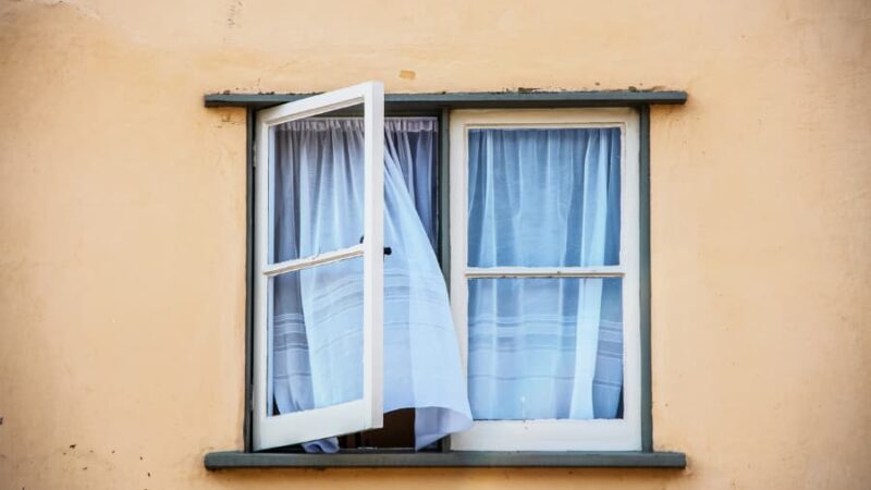 A casement window, partially open