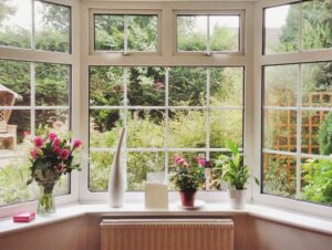 Bay windows with a display shelf for plants and flowers
