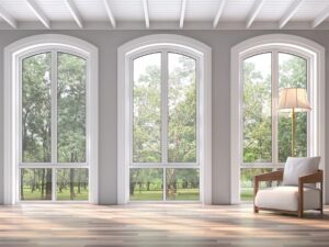 Specialty windows in living room overlooking scenic landscape 