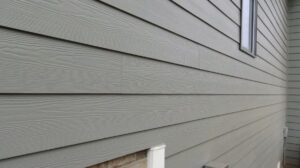 Home undergoing replacement siding services 