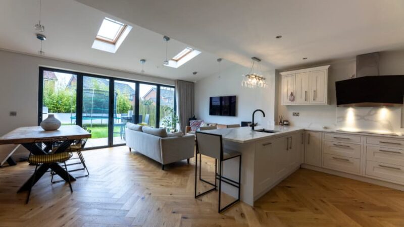 Open plan home with kitchen living room and patio door